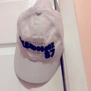 White blue and black hat